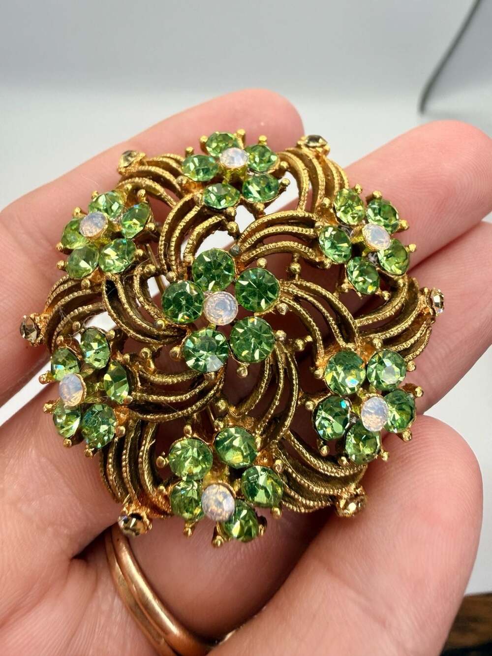 Vintage uranium Gold Tone Green Rhinestone Flower Brooch Pin